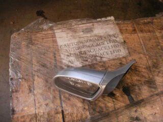 RETROVISOR IZQUIERDO OPEL CORSA B Swing - fotografía 1