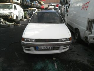 FARO IZQUIERDO MITSUBISHI COLT (C50A) - fotografía 3