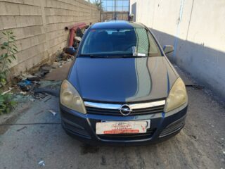 FARO DERECHO OPEL ASTRA H BERLINA - fotografía 4