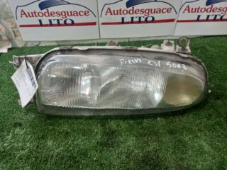 FARO IZQUIERDO FORD FIESTA BERLINA Ghia - fotografía 1